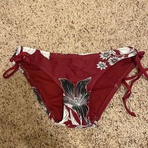 Maroon and white bikini bottoms. Size small.